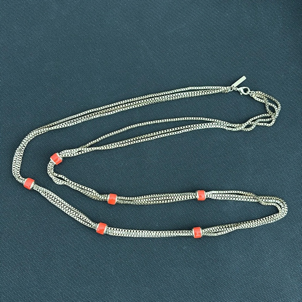 Mythologie long gold tone necklace w/ orange beads
